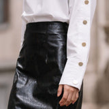 long-sleeve-button-down-with-cuffed-closures-for-women-in-leadership