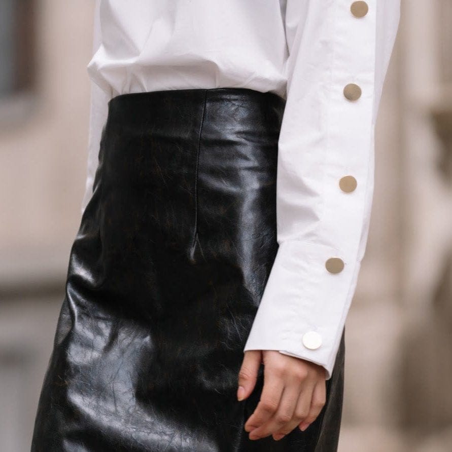 long-sleeve-button-down-with-cuffed-closures-for-women-in-leadership