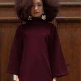 pink-brera-dress-airport-to-boardroom-travel-capsule-wardrobe