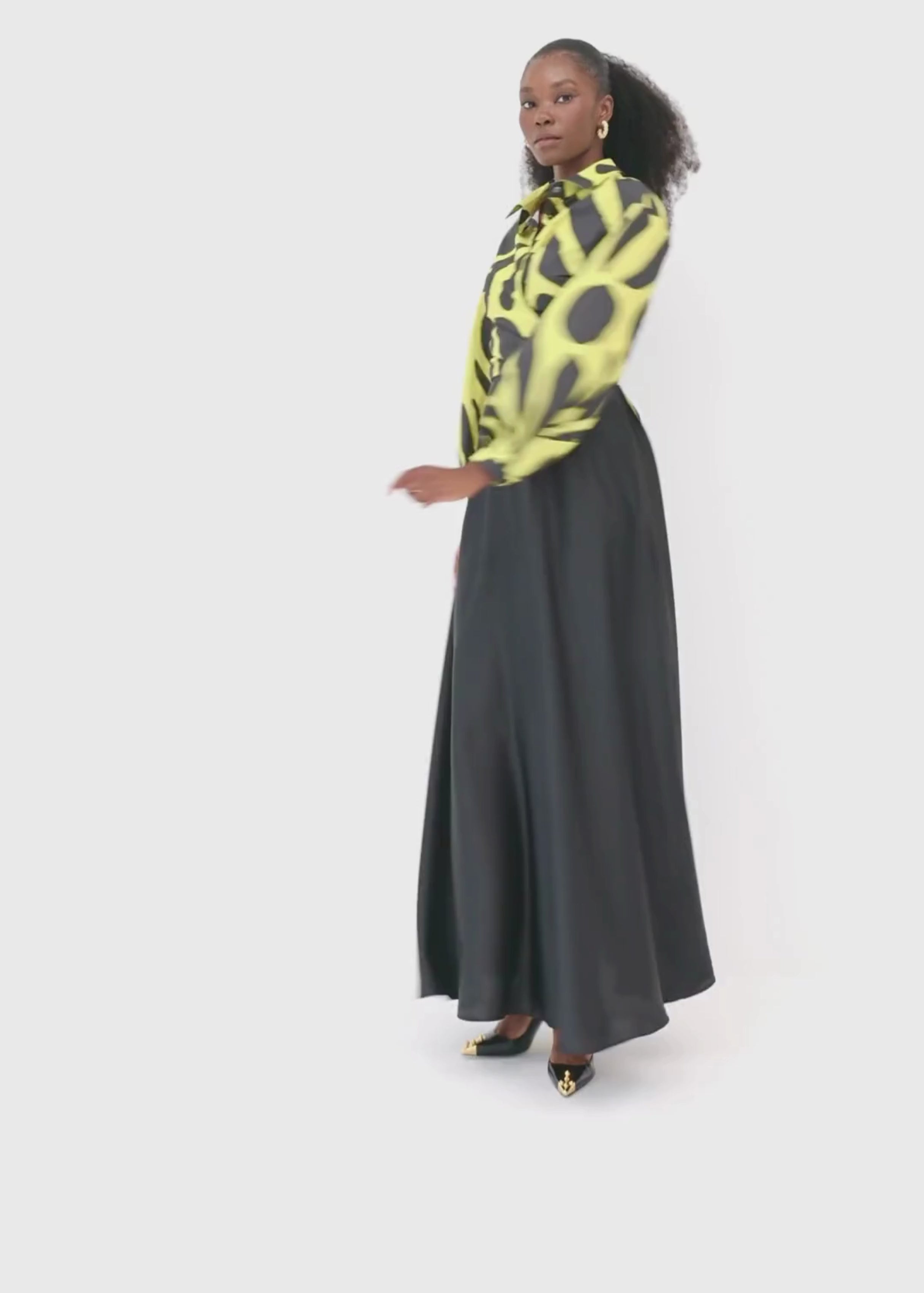 Model Wearing Faith Fluid Flared Maxi Skirt