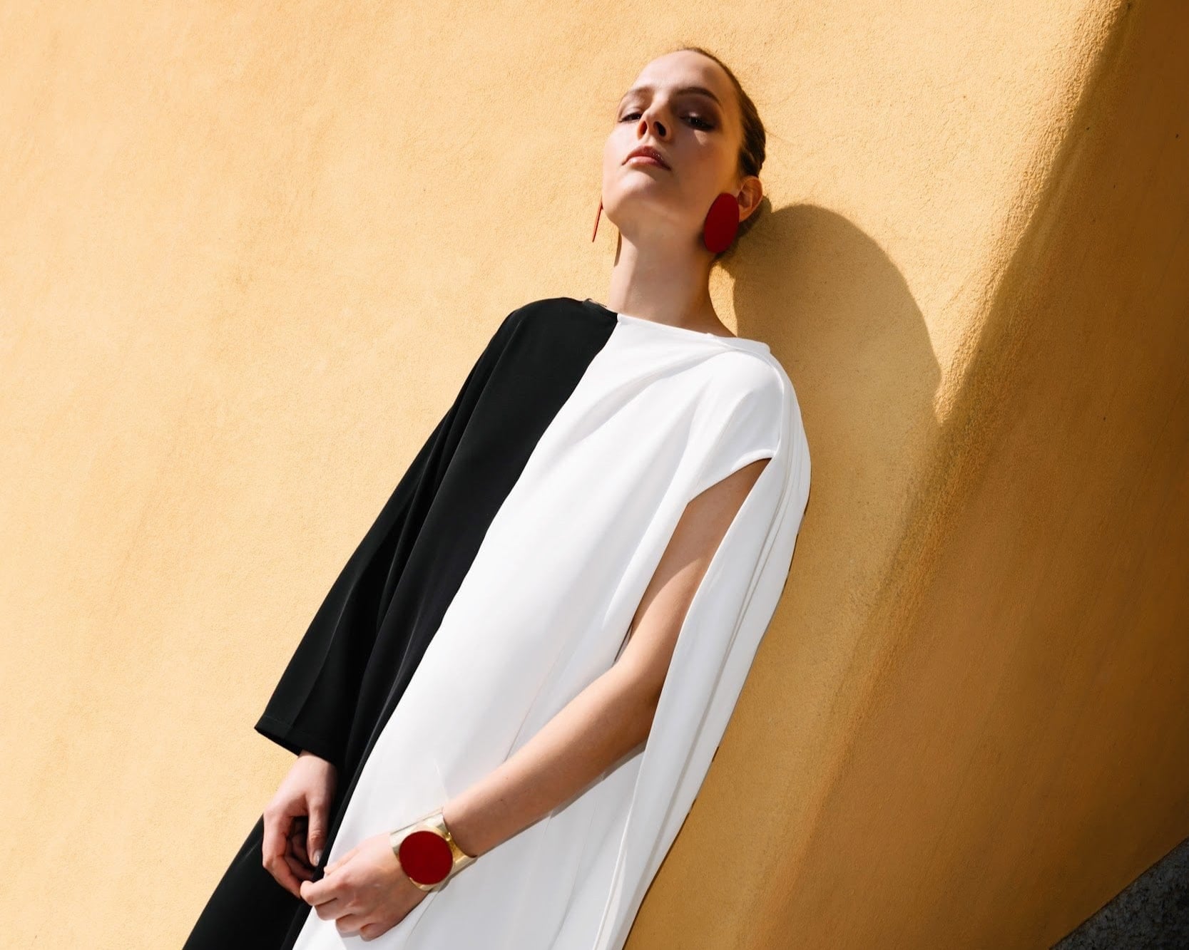 woman-wearing-beige-black-diana-fluid-maxi-dress-for-executive-events