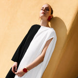 woman-wearing-beige-black-diana-fluid-maxi-dress-for-executive-events