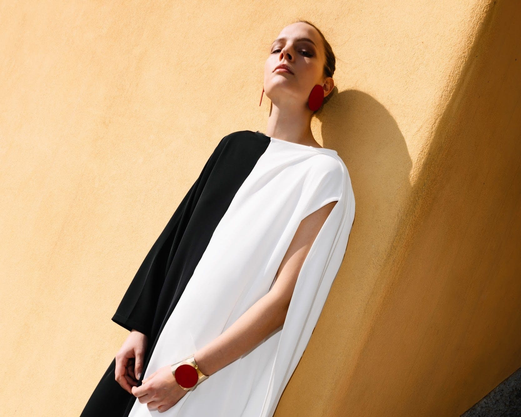 woman-wearing-beige-black-diana-fluid-maxi-dress-for-executive-events