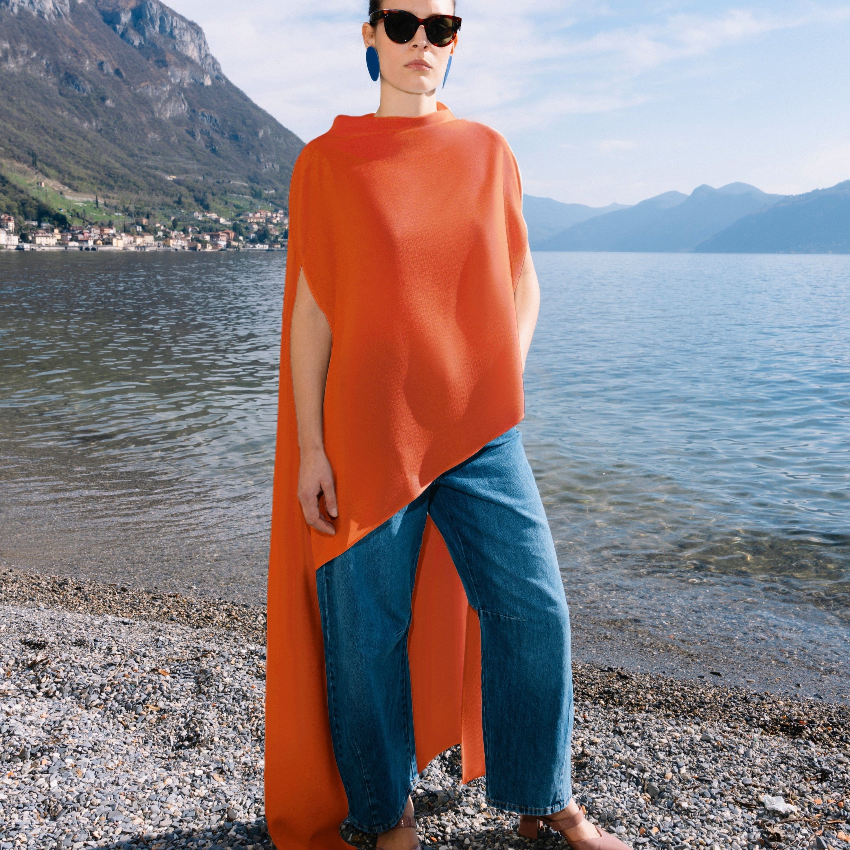 woman-wearing-white-lekki-summer-cape-asymmetrical-floor-length-train